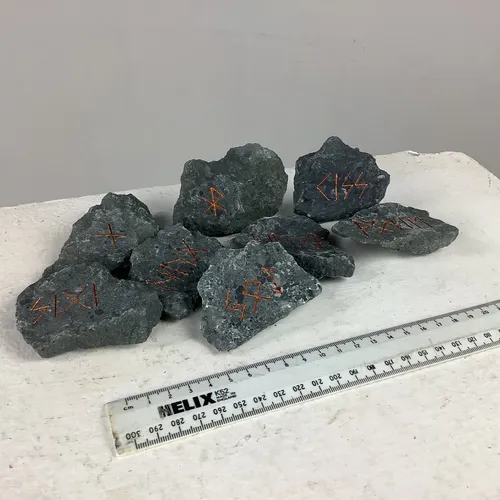 Rocks with Rose Gold Engraved Rune Symbols