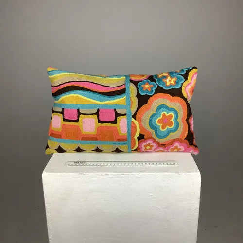 Long, 60s inspired, embroidered cushion 