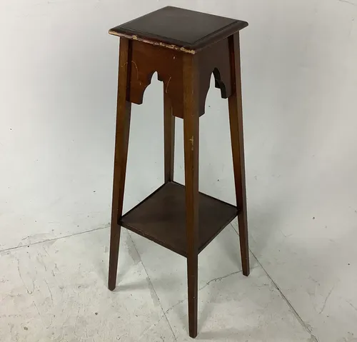 dark wood table / plant stand with gothic arches and lower shelf