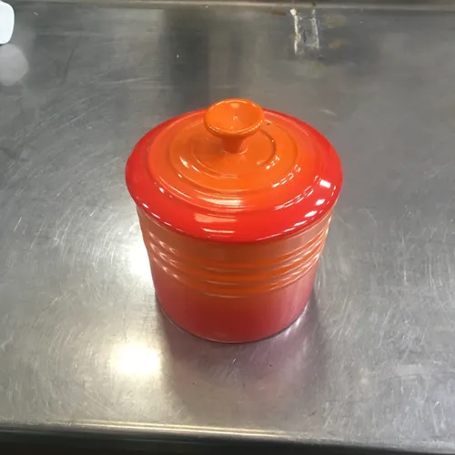 Orange Lidded Le Creuset Pot