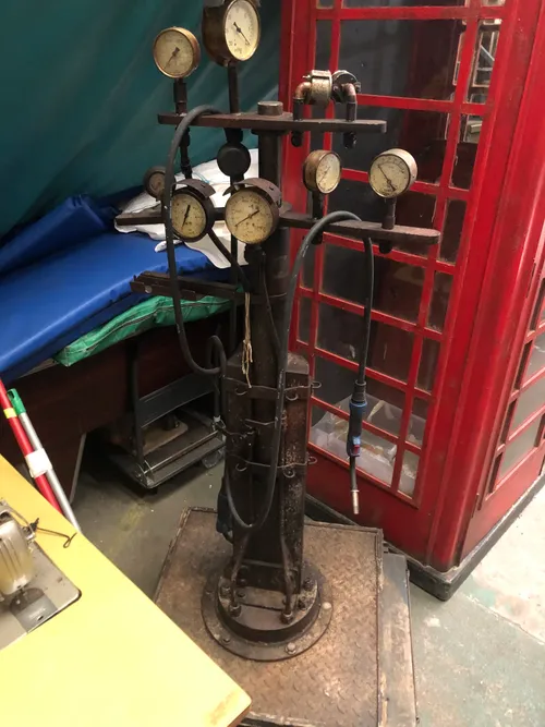 Steampunk fuel pump pipes and gauges on base