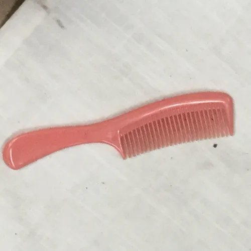 Pink plastic comb 