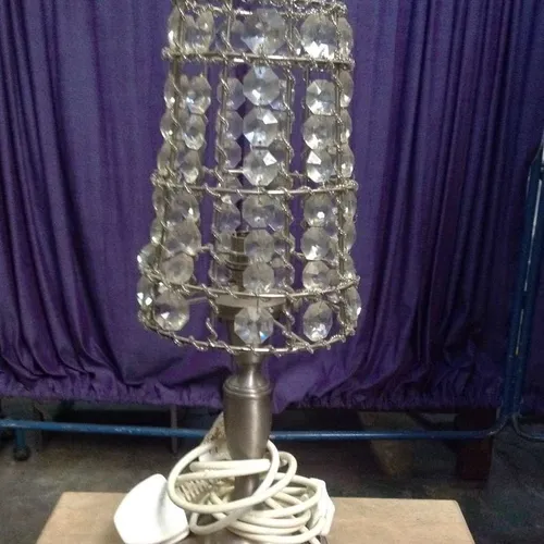 silver metal table lamp with faux crystal shade