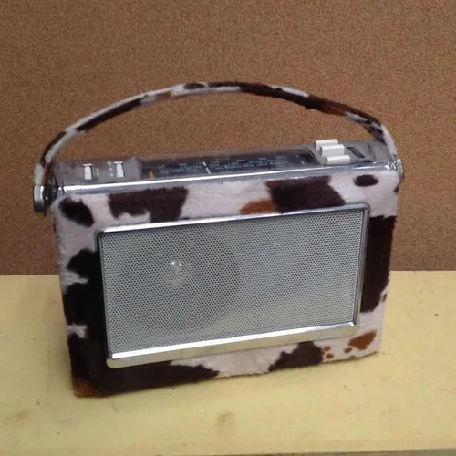 Bush portable radio with furry fabric cow print outer