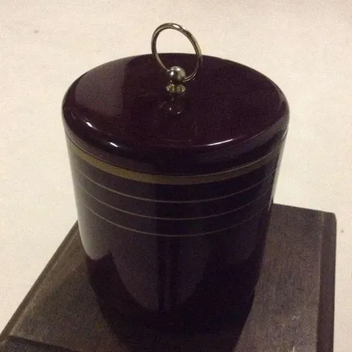 Period ice bucket with lid. Maroon with gold stripes
