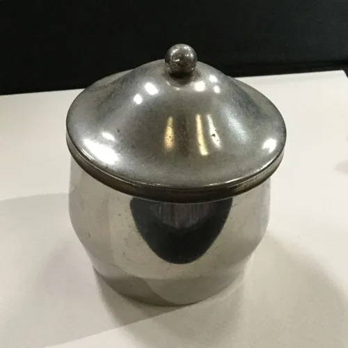 Metal sugar bowl with lid