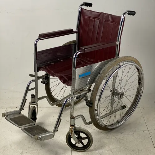 Red and silver Carter’s wheelchair