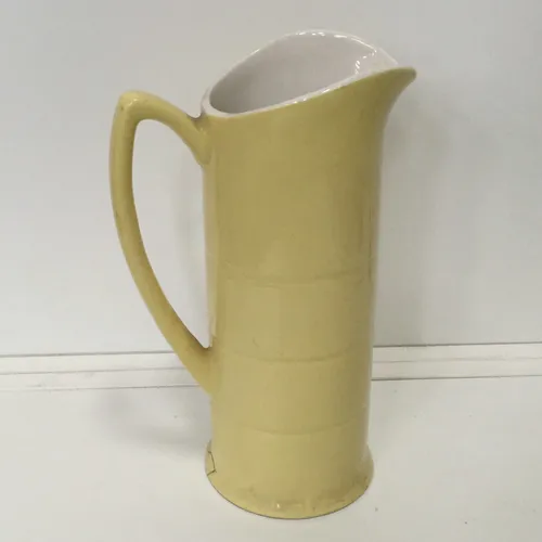Yellow ceramic jug 
