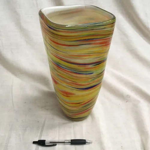 Colourful ceramic vase with scalloped edge