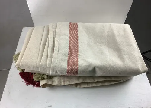 Cream and red striped fabric 