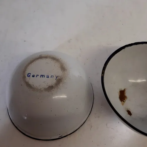 Small white enamel bowl with blue trim (Made in Germany)