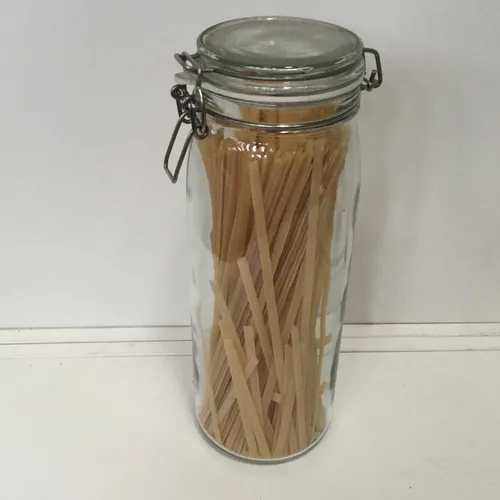 Tall spaghetti jar with sealed lid