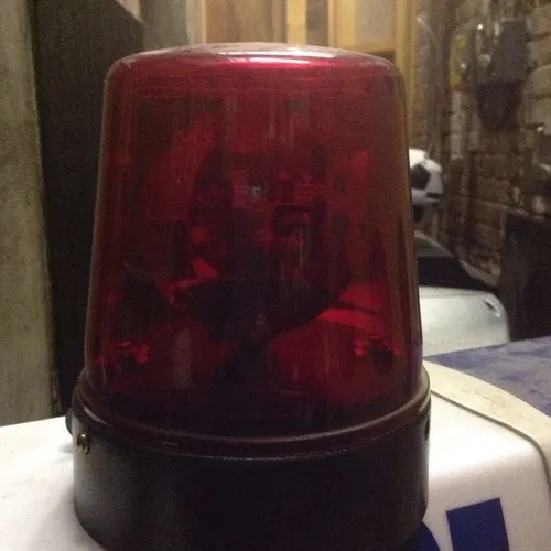 small red plastic emergency light