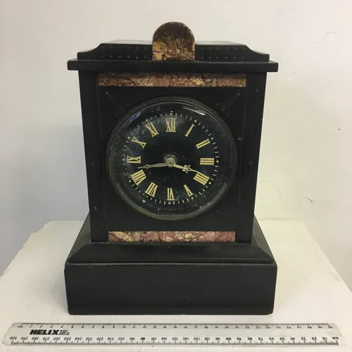 Antique black marble and slate mantle clock with glass face cover (approx 1880s)