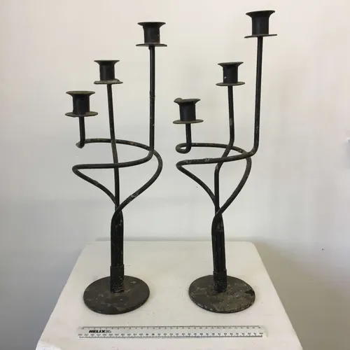 Pair of twisted wrought iron candlesticks