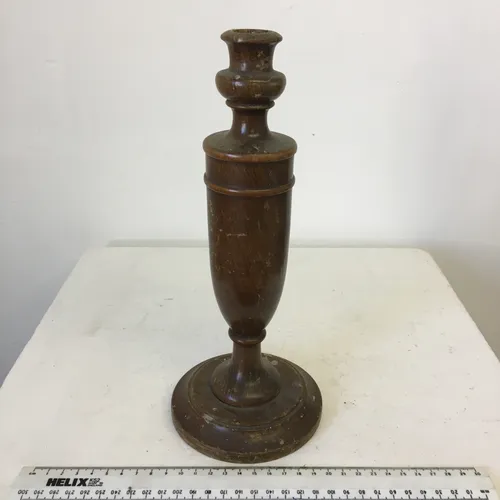 Period wood bullet shaped candle holder