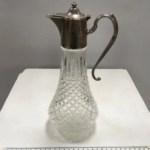Cut glass, jug decanter with metal spout and handle