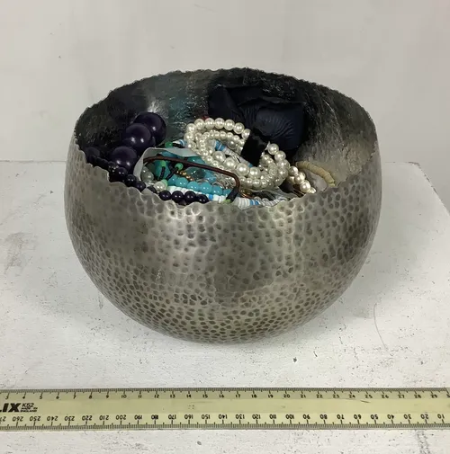 Large Hammered Metal Bowl with Quantity of Jewellery