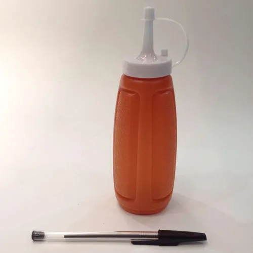 brown plastic sauce bottle
