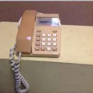 two tone brown Sceptre 100 corded push button telephone with digital display