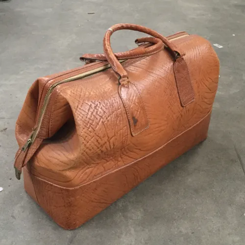 Period light brown leather hold-all 