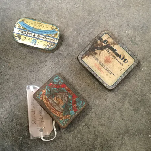 Variety of small tins