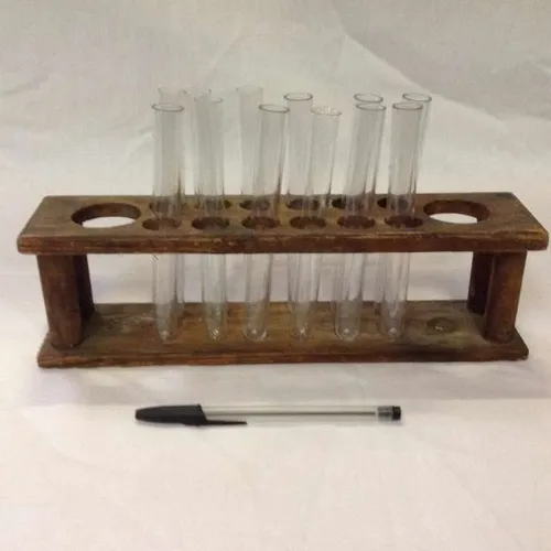 Wooden test tube holder with glass test tubes