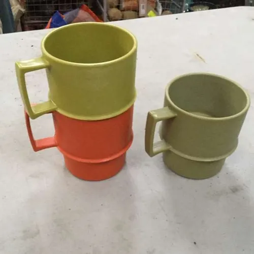 Coloured plastic stackable cups