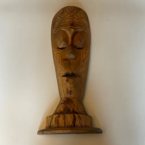 Carved Wooden Face Ornament
