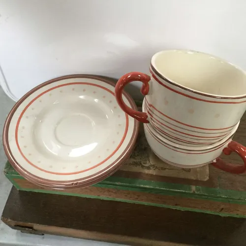 Red striped/spotty teacup and saucer set