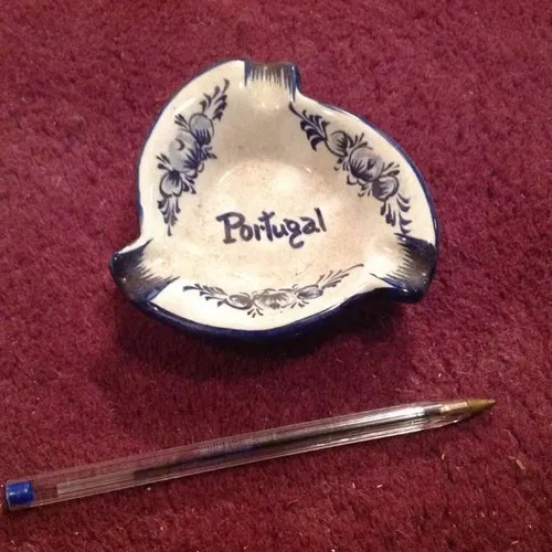 blue and white ceramic souvenir ashtray