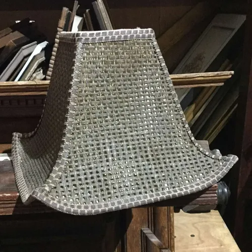 Grey wicker lampshade with curved base