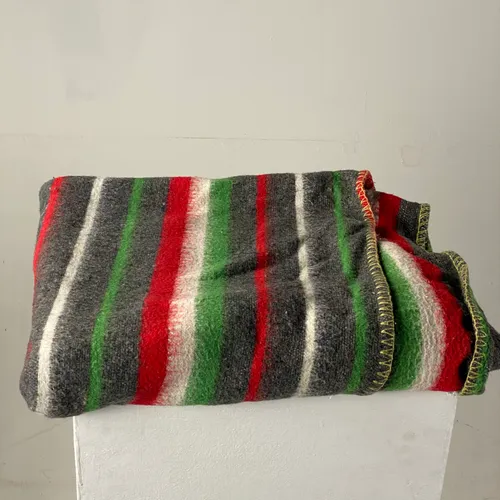 Grey, Red, white and green woollen blanket