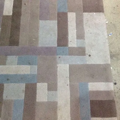 Area Rug with Tetris-like Pattern in Blue/Grey/Tan/Brown