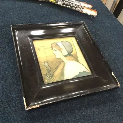 Painting of a woman in dark wood frame