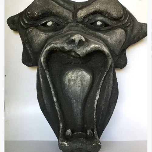 large painted polystyrene gargoyle head