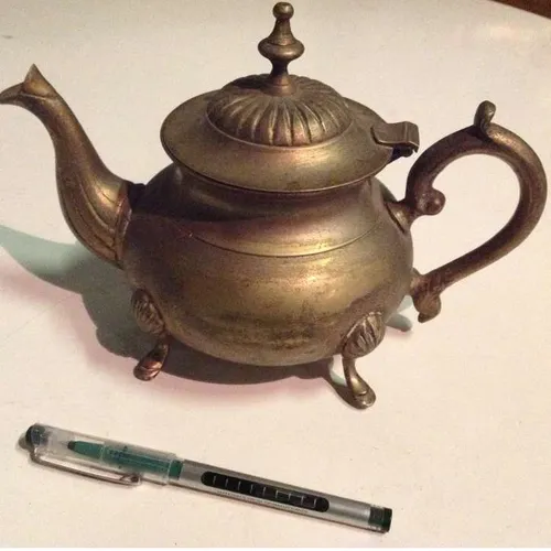 decorative brass tea pot with hinged lid
