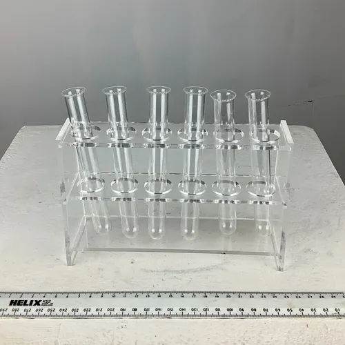 Clear plastic test tube holder with six test tubes