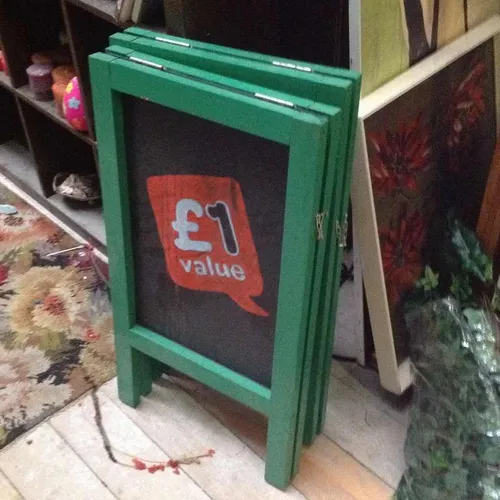 A -frame chalkboard with green border