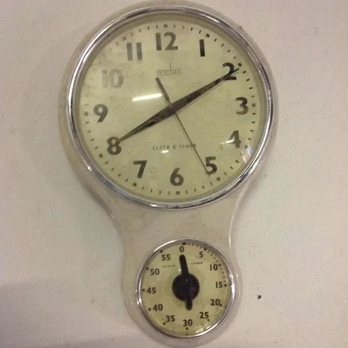 Acctim analogue cream coloured wall clock and timer with yellow/cream face and glass face cover