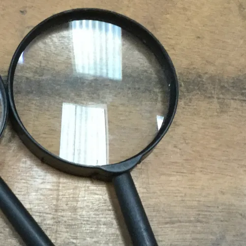 Black plastic magnifying glass