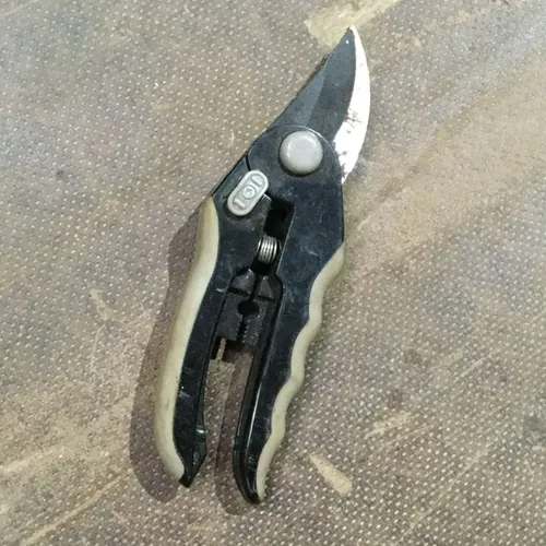 Black and grey pruning secateurs