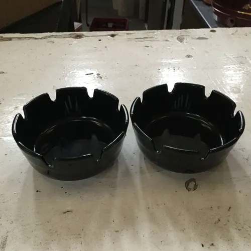 Black plastic ashtrays