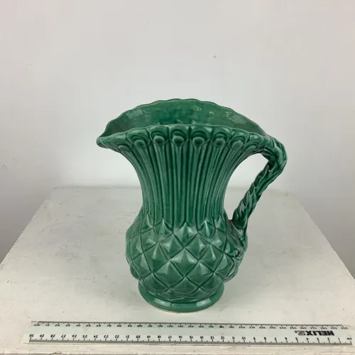 Green Glasgow pottery thistle shaped glazed ceramic jug