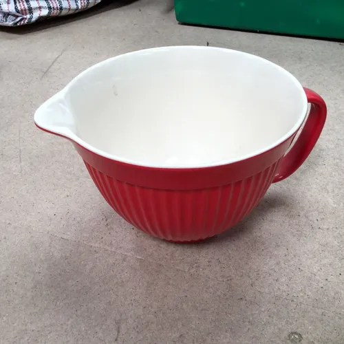 Red mixing bowl with handle and spout