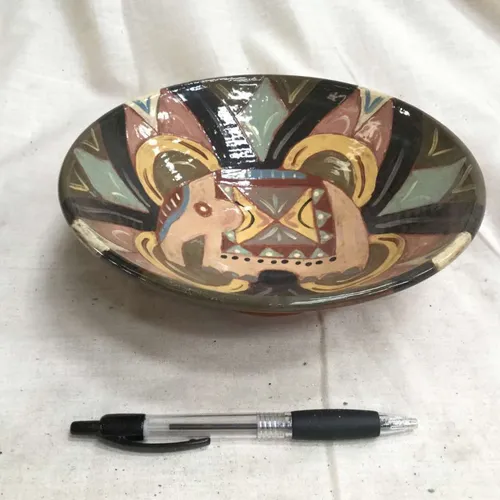 Ceramic bowl with hand-painted elephant design 