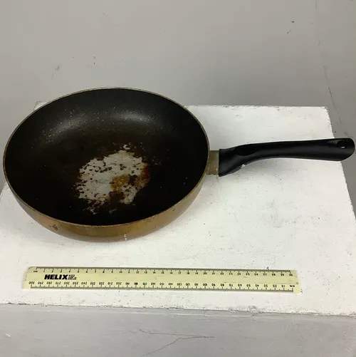 Brown and Black Wok