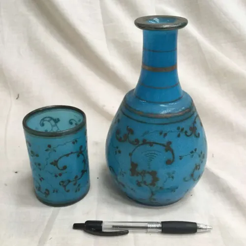 Blue and gold glass decanter and cup