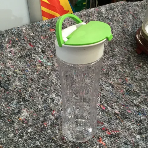 Clear Plastic Water bottle with White Green Lid