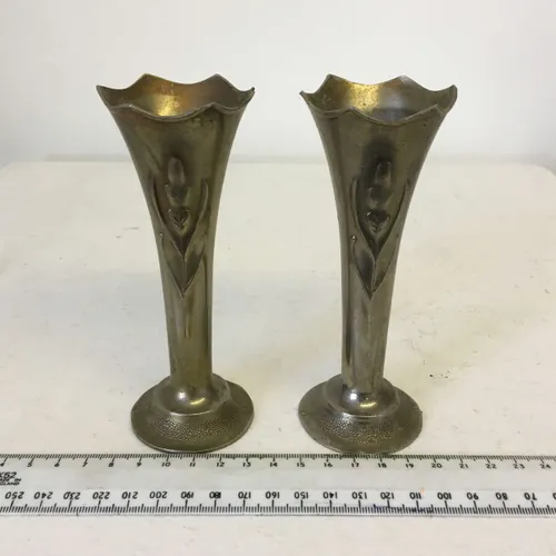 Pair of brass tulip like candlesticks